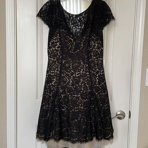 Short dress from Nordstrom rack. Black lace over cream liner. Size 6